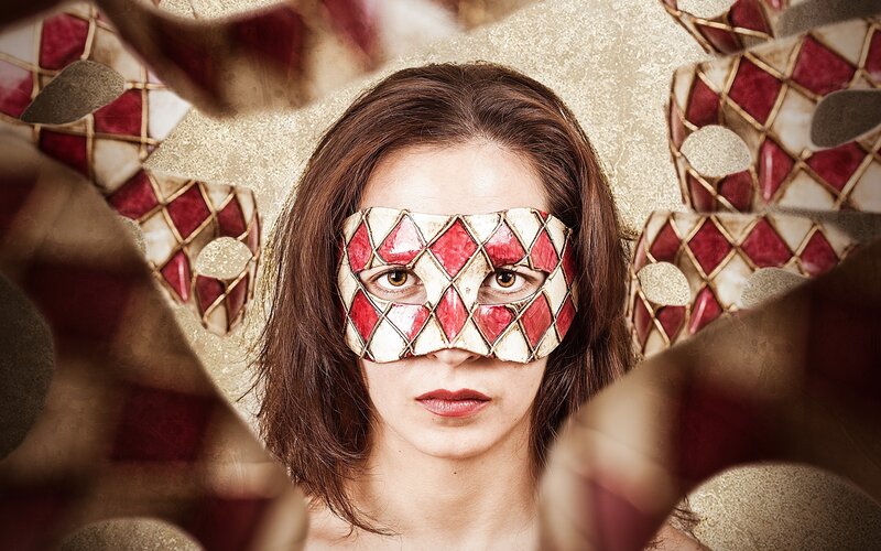 woman with red and white mask