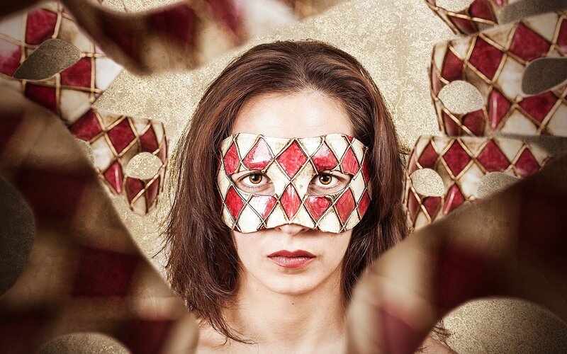 woman with red and white mask