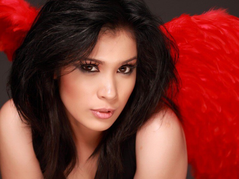 woman with red angel wings