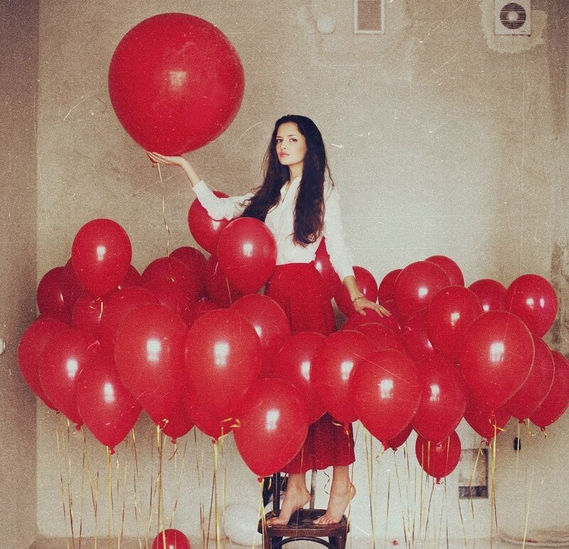 Woman with Red Balloons — Dramatic, Photograph, Stool