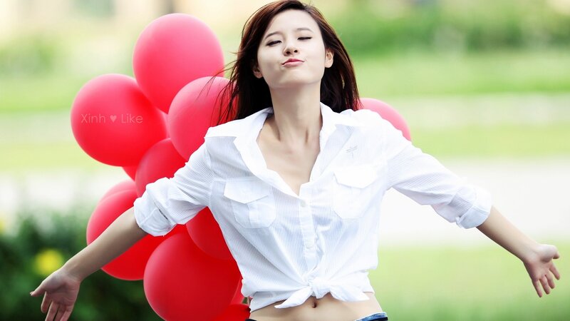 Woman with Red Balloons — Playful
