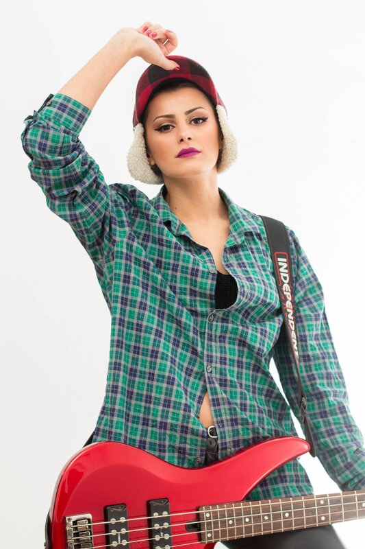 woman with red bass guitar