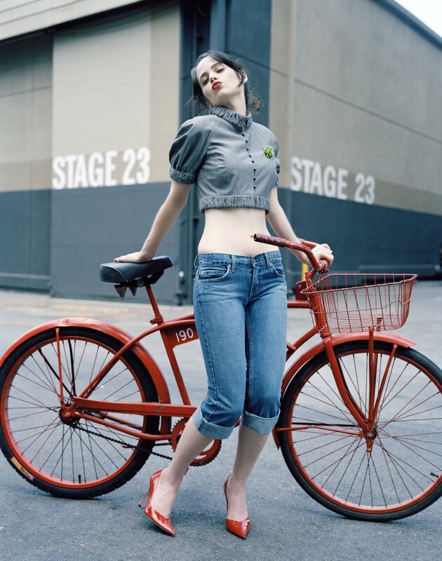 Woman with red bicycle