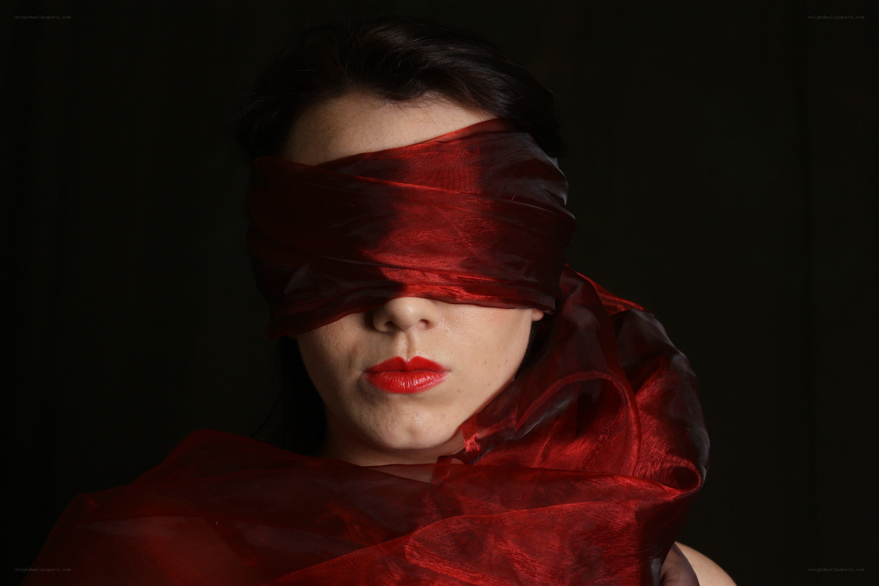 woman with red blindfold