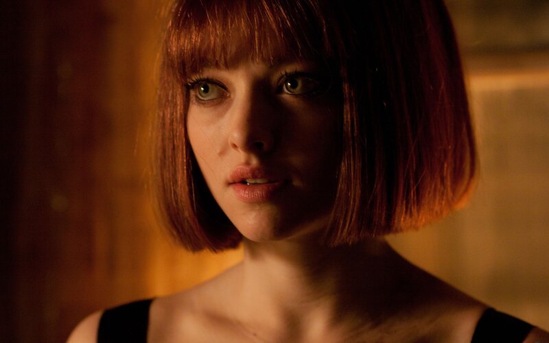 woman with red bob haircut