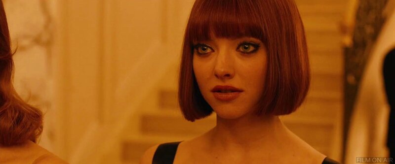 woman with red bob haircut