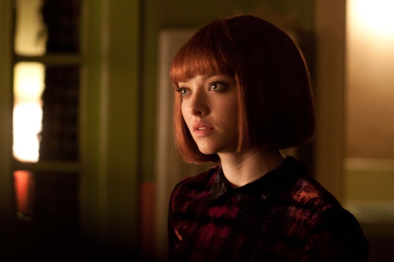 woman with red bob haircut