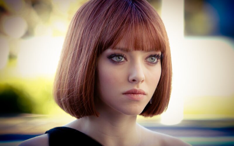 woman with red bob haircut