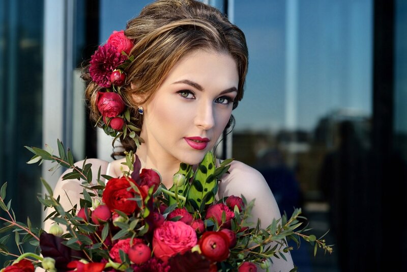 Woman with Red Bouquet