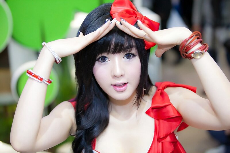 Woman with Red Bow — Playful