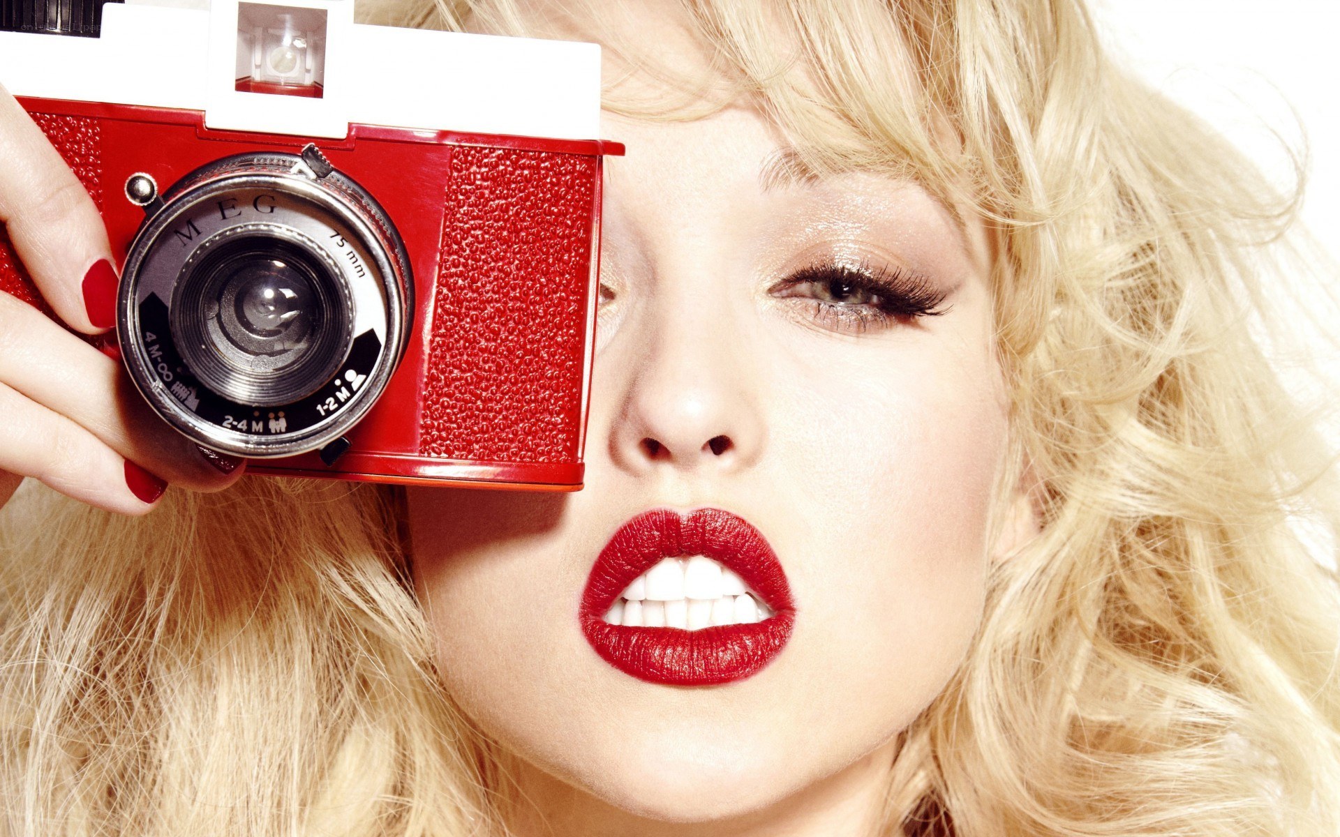 woman with red camera