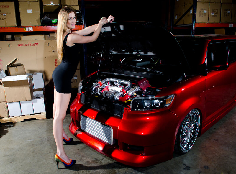 Woman with Red Car — Dramatic, Photograph, Engine