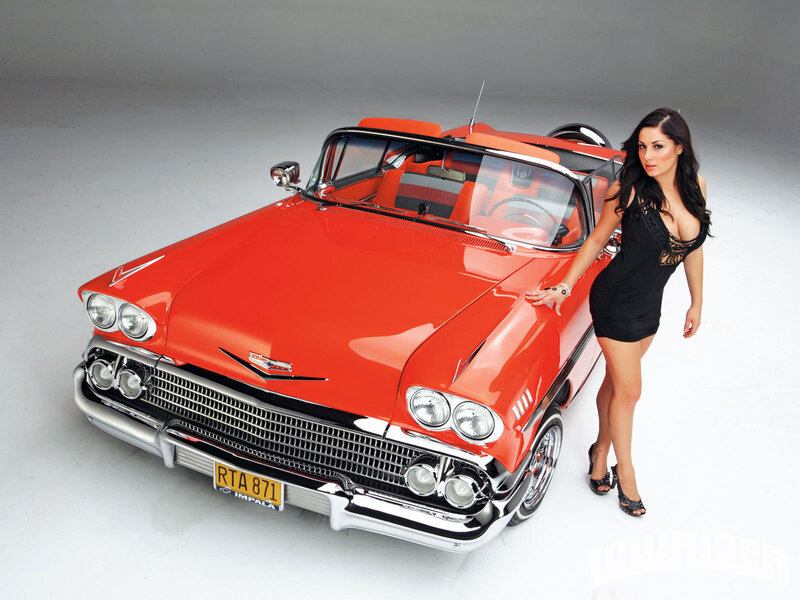 Woman with Red Car — Dramatic, Photograph