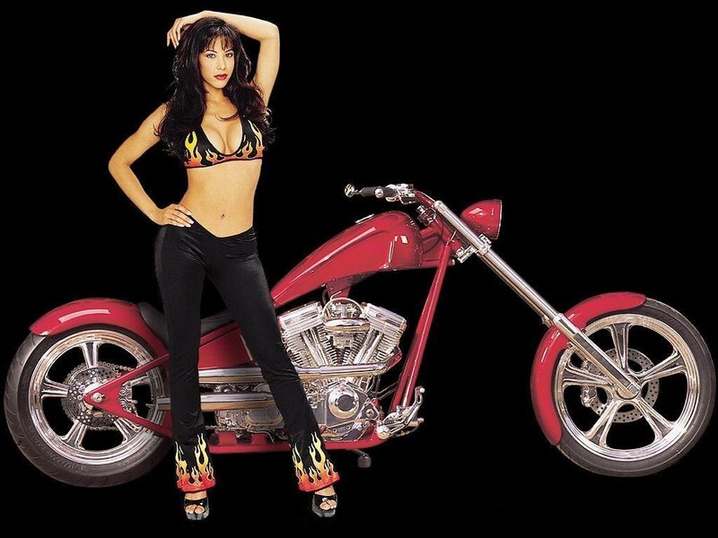 Woman with red chopper motorcycle
