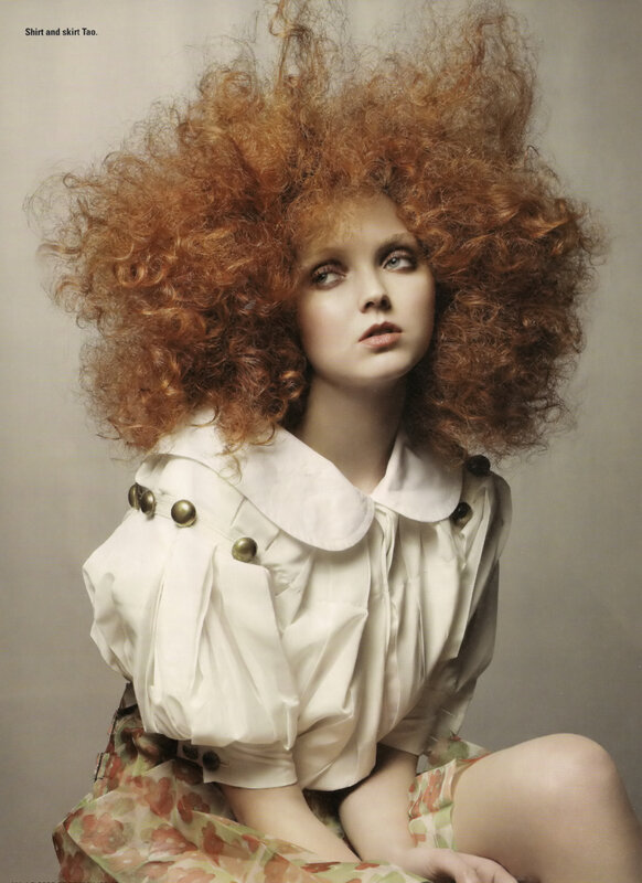 woman with red curly hair