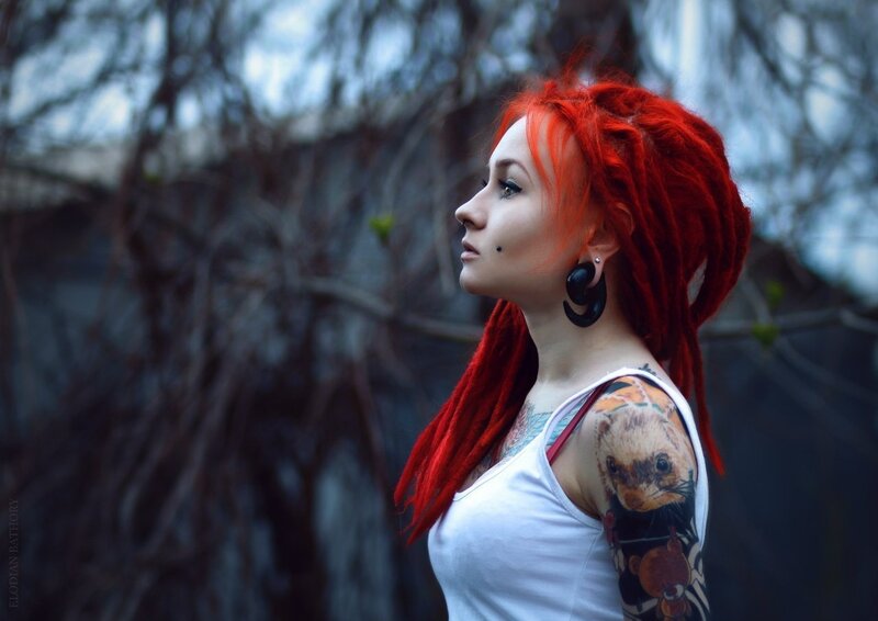 Woman with Red Dreadlocks — Contemplative