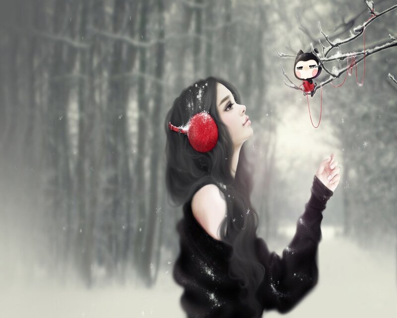 Woman with red earmuffs in winter