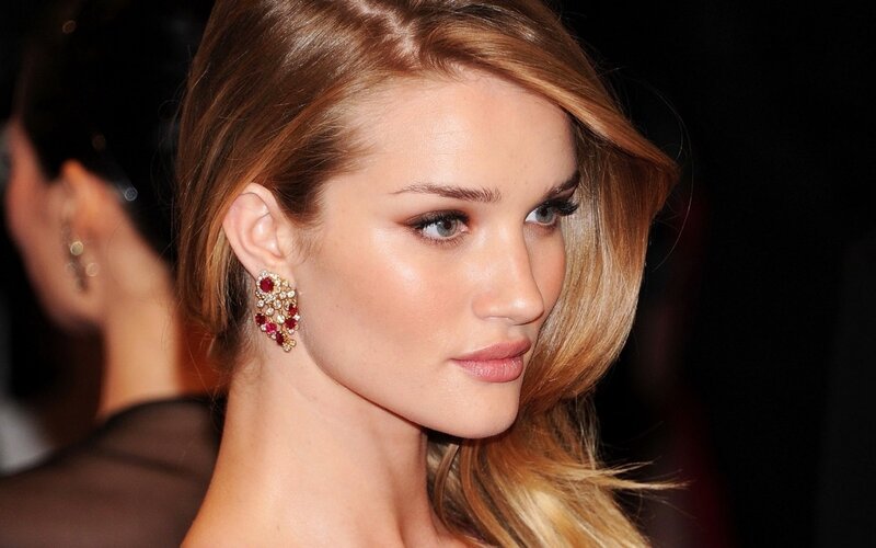 woman with red earrings