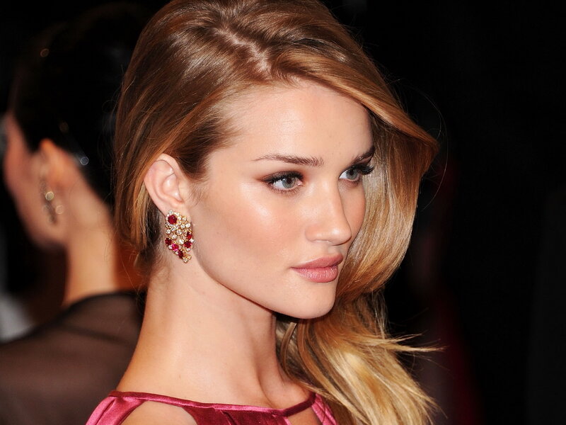woman with red earrings
