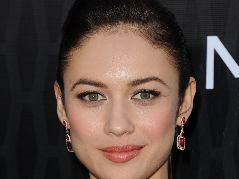 woman with red earrings