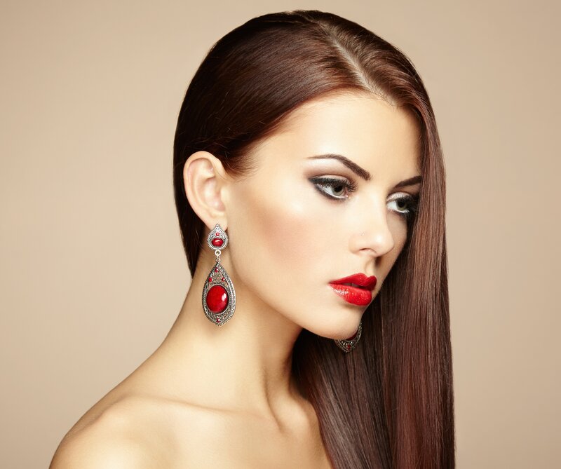 Woman with Red Earrings — Brown