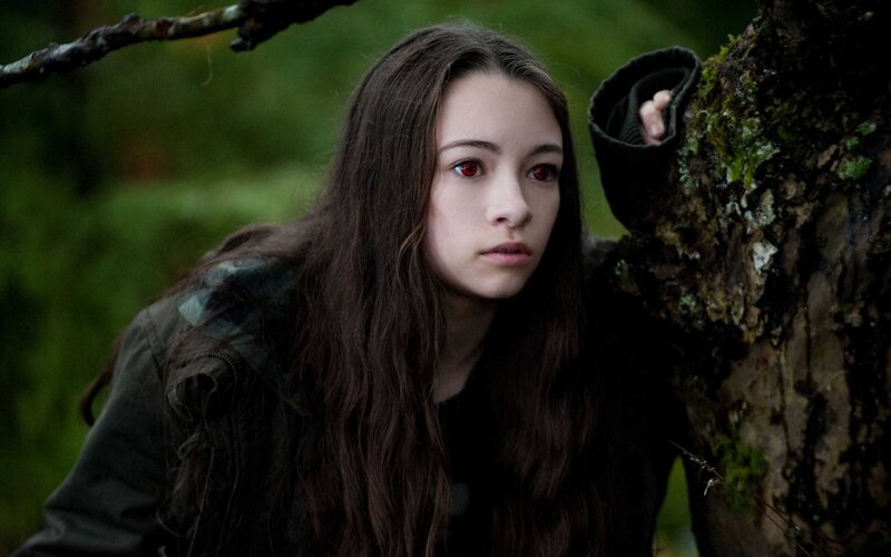 woman with red eyes in forest