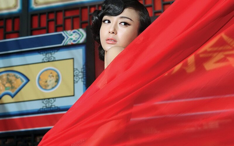 woman with red fabric