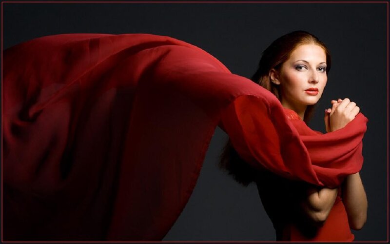 woman with red fabric