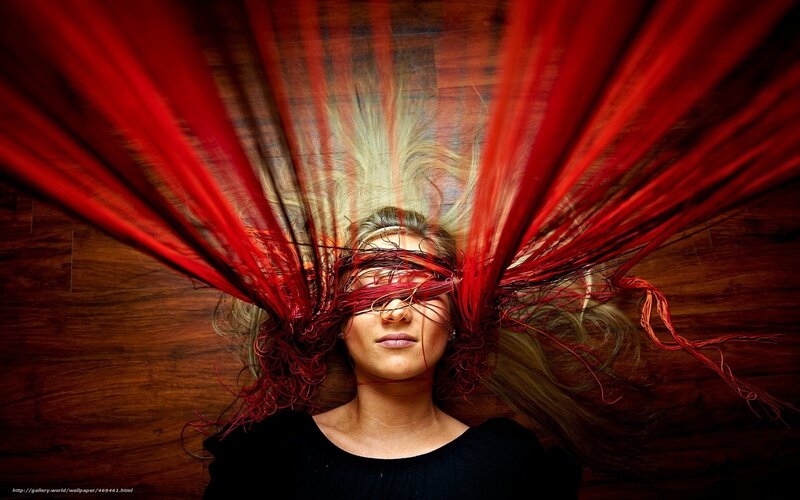 woman with red fabric wings