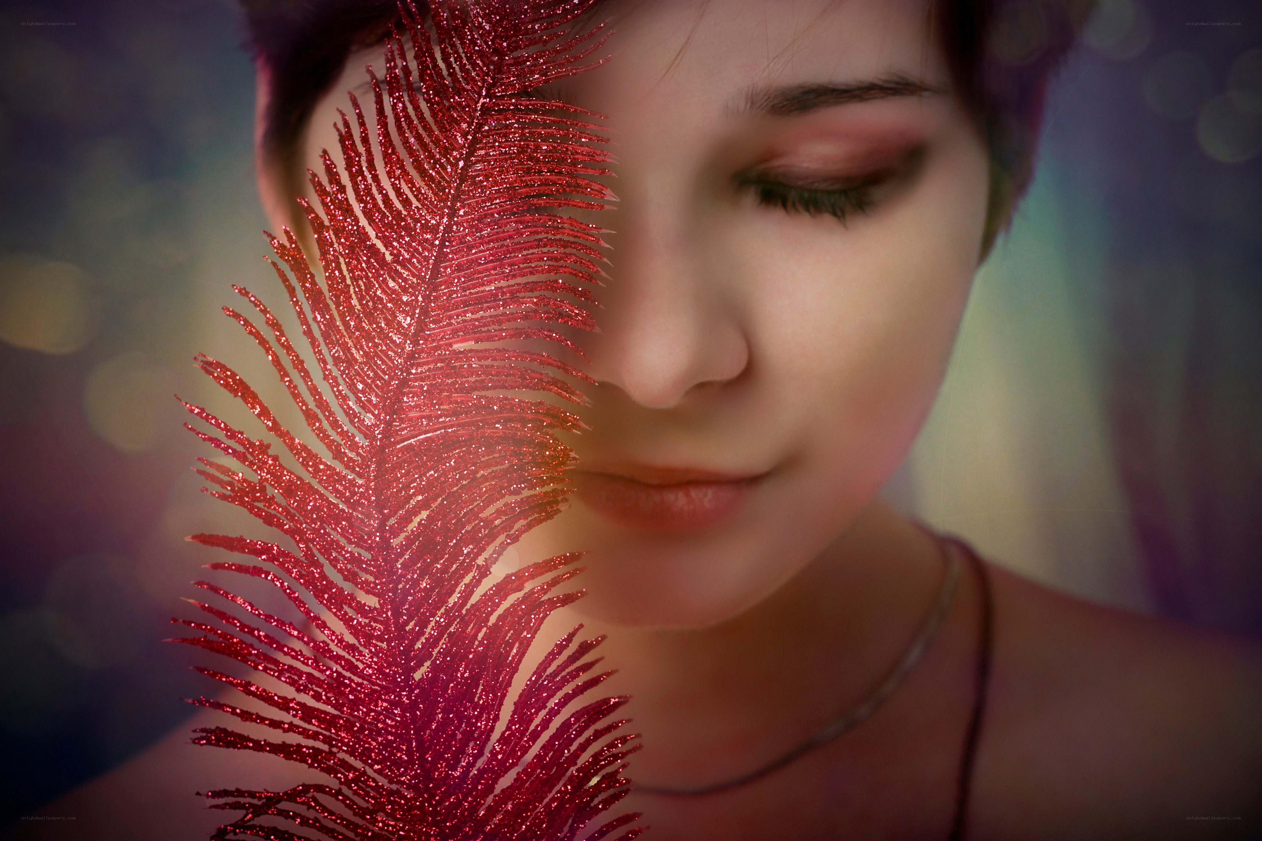 woman with red feather