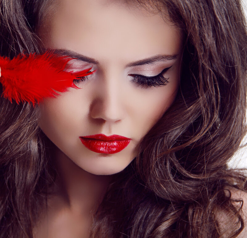 Woman with Red Feather — Dramatic, Photograph