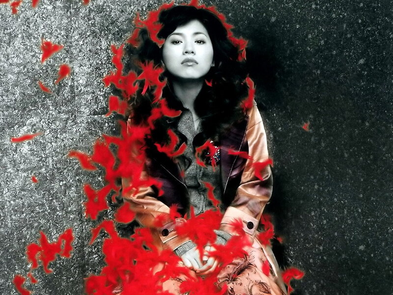 woman with red feathers
