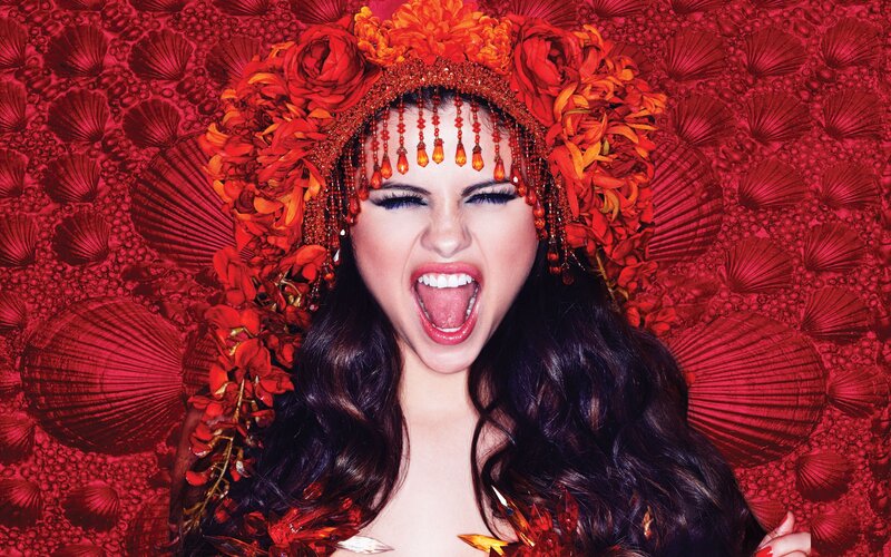 woman with red floral crown
