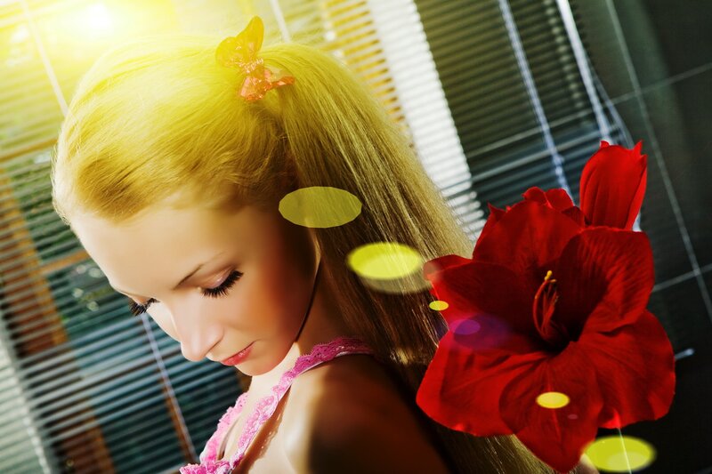 woman with red flower