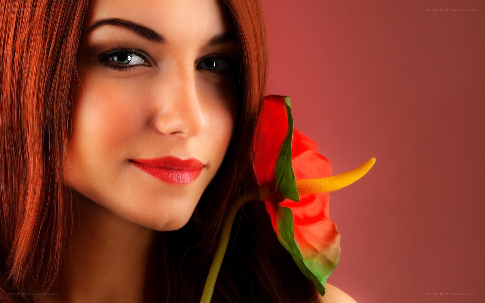 woman with red flower