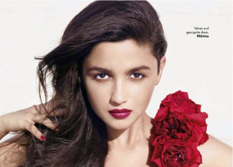 woman with red flower