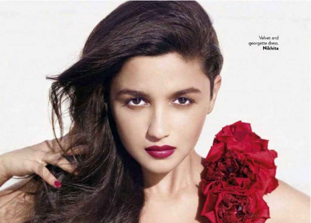 woman with red flower