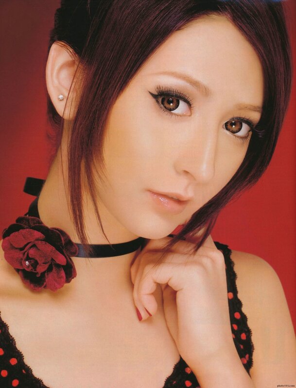woman with red flower choker