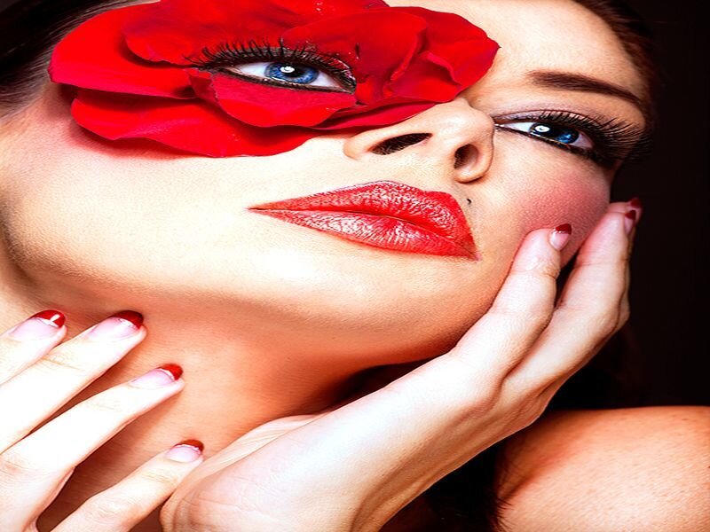 Woman with Red Flower — Dramatic, Photograph