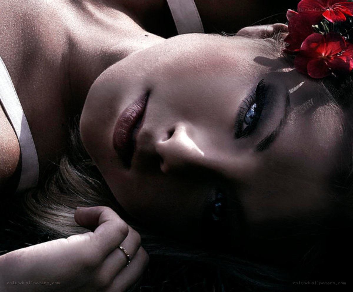 woman with red flowers