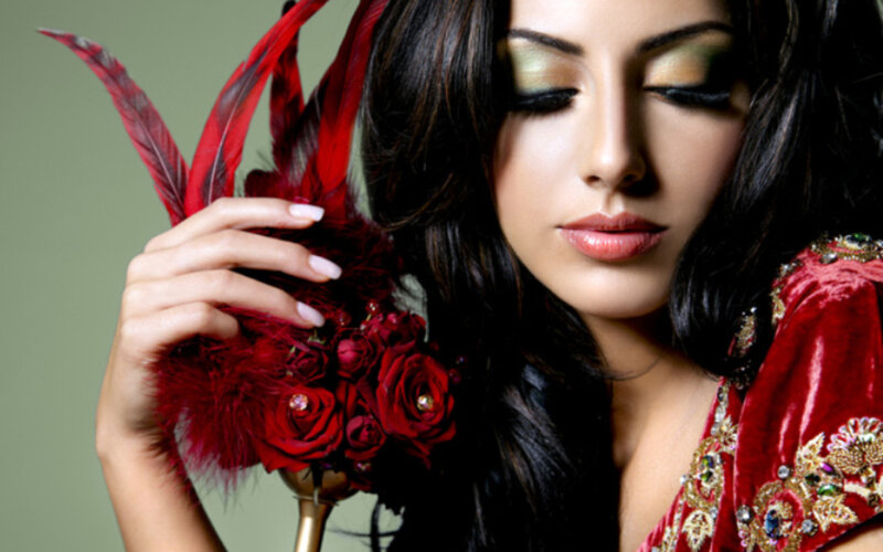 Woman with Red Flowers — Dramatic, Photograph, Feathers