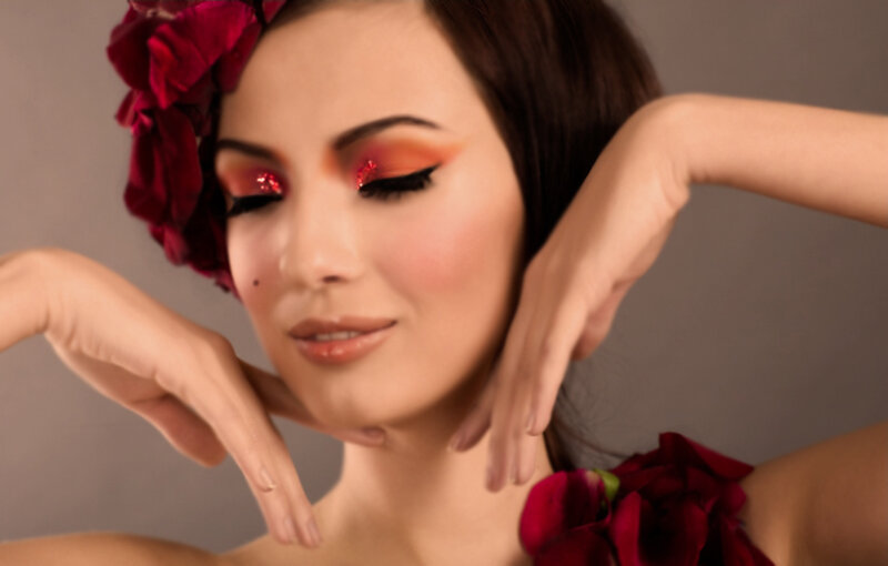 Woman with Red Flowers — Dramatic, Photograph