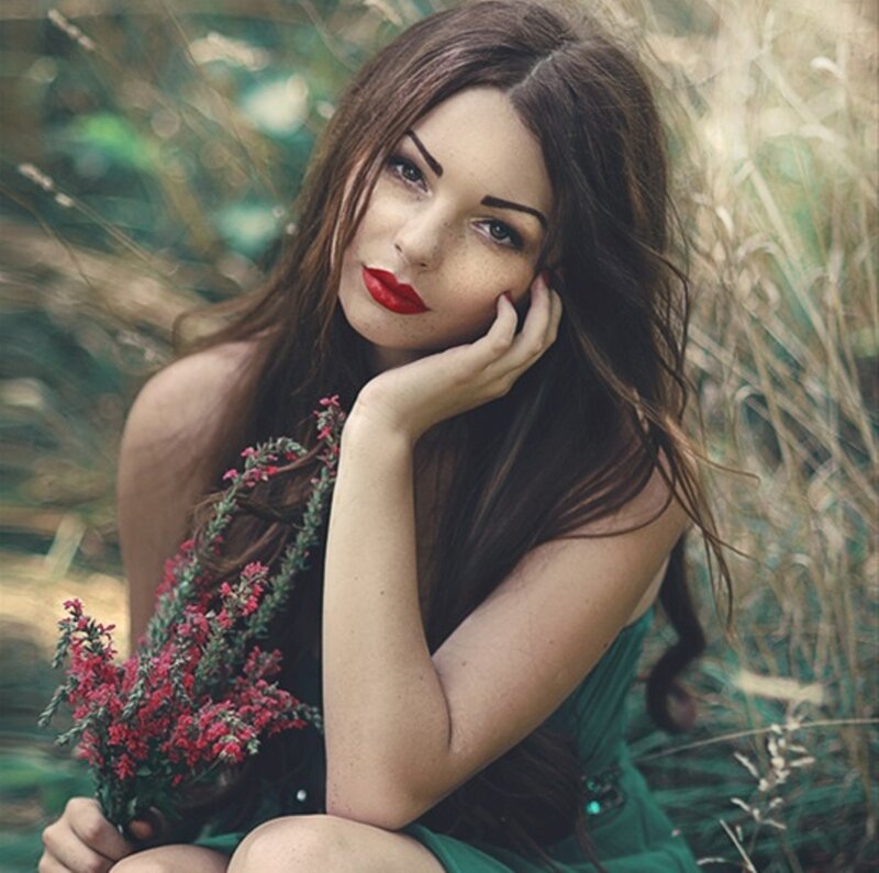 Woman with Red Flowers — Green, Contemplative
