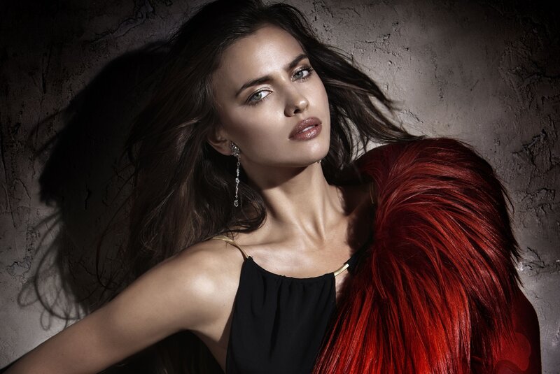 woman with red fur stole