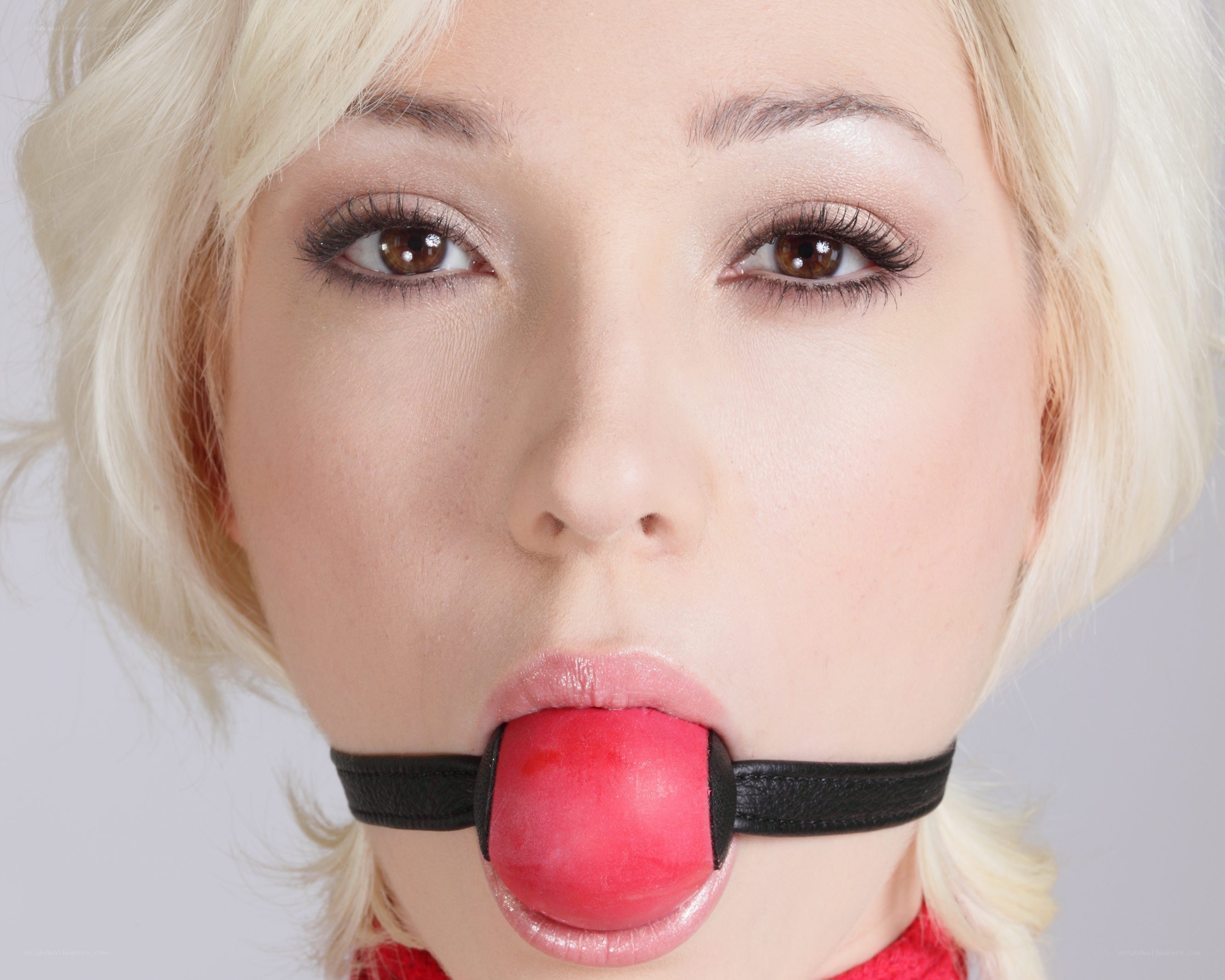woman with red gag
