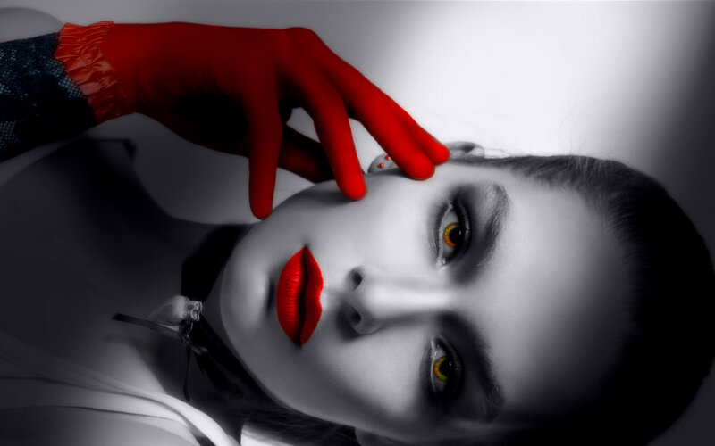 woman with red gloves and lipstick