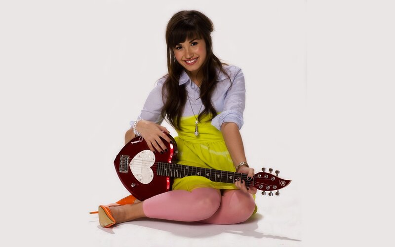 woman with red guitar