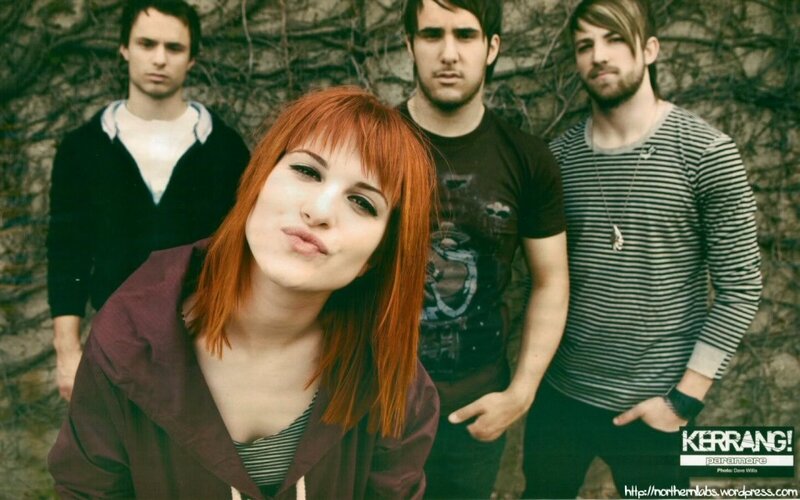 Woman with Red Hair and Band — Serious