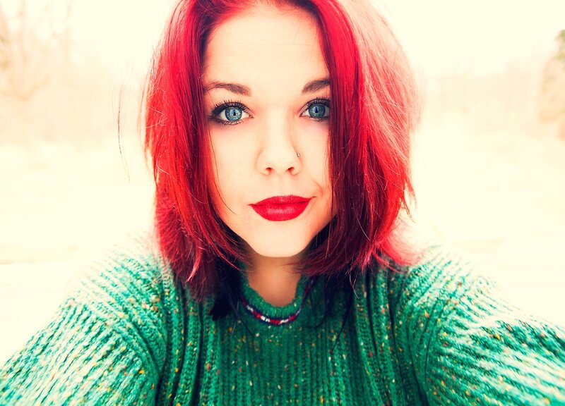 woman with red hair and blue eyes