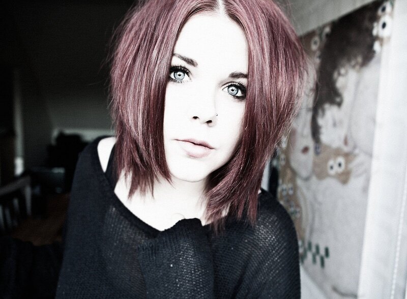 woman with red hair and blue eyes